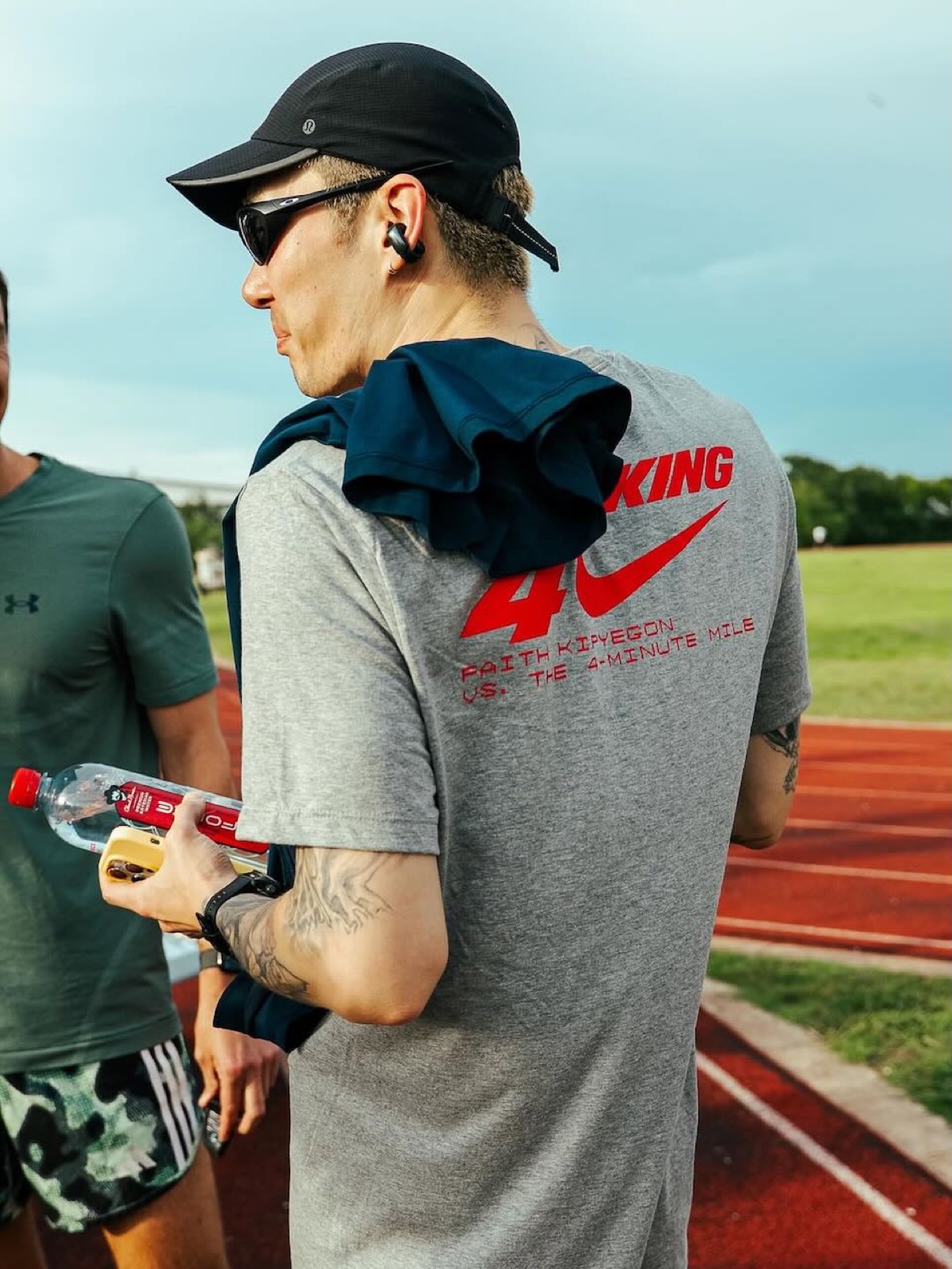 Breaking4 event tee we produced, reading Faith Kipyegon vs. the 4-minute mile, at a track watch party